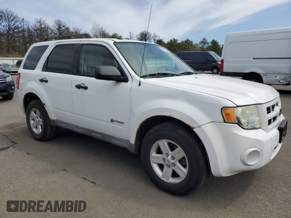 2010 Ford Escape Hybrid z VIN 1FMCU5K35AKC13081, wystawiony jako Copart lot #55447445 z przebiegiem 74 496 mil mil oraz Czysty tytuł • Clean title. Historia ofert i sprzedaży dostępna na DreamBid. Obrazek 4.