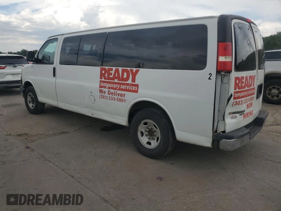 2014 Chevrolet Express Passenger LT with VIN 1GAZG1FGXE1157798, listed as a Copart auction lot 64301595 with 272,982 mi miles and Clean title. Bid and sale history available at DreamBid. Image 2.