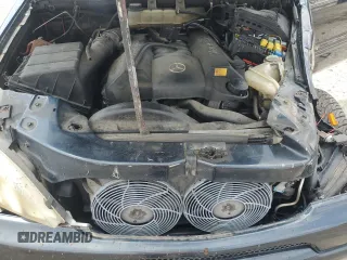 2000 Mercedes-Benz M 320/430/500 with VIN 4JGAB72E7YA168445, listed as a Copart auction lot 59401235 with 231,591 mi miles and Salvage title. Bid and sale history available at DreamBid. Image 12.