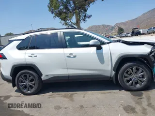 2024 Toyota RAV4 Hybrid XLE Premium with VIN JTMB6RFV9RJ063328, listed as a IAAI auction lot 42433233 with 9,874 mi miles and . Bid and sale history available at DreamBid. Image 14.
