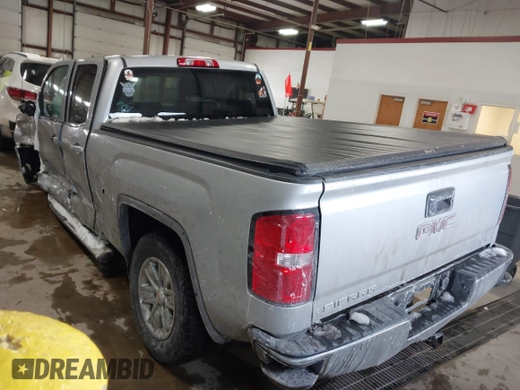 2018 GMC Sierra 1500 SLE z VIN 1GTV2MEH8JZ357073, wystawiony jako IAAI lot #41642234 z przebiegiem 105 007 mil mil oraz . Historia ofert i sprzedaży dostępna na DreamBid. Obrazek 3.