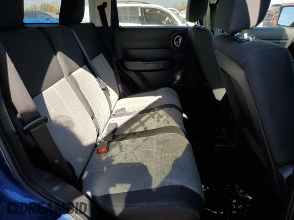 2009 Dodge Nitro SE z VIN 1D8GT28KX9W530723, wystawiony jako Copart lot #76746494 z przebiegiem 209 817 mil mil oraz Szkoda całkowita • Salvage title. Historia ofert i sprzedaży dostępna na DreamBid. Obrazek 11.
