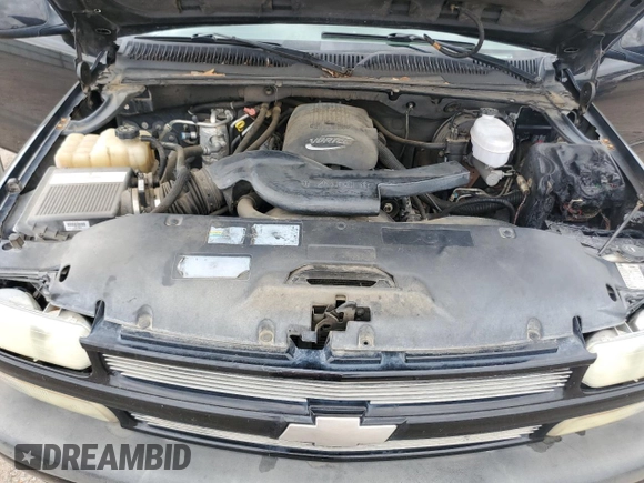 2003 Chevrolet Tahoe Z71 z VIN 1GNEK13Z13R301464, wystawiony jako Copart lot #53905395 z przebiegiem 165 360 mil mil oraz Szkoda całkowita • Salvage title. Historia ofert i sprzedaży dostępna na DreamBid. Obrazek 12.