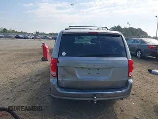 2016 Dodge Grand Caravan SXT with VIN 2C4RDGCG7GR325113, listed as a IAAI auction lot 42045811 with 86,372 mi miles and . Bid and sale history available at DreamBid. Image 17.