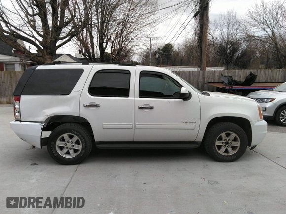 2013 GMC Yukon SLT with VIN 1GKS2CE09DR238626, listed as a IAAI auction lot 41758168 with 170,371 mi miles. Bid and sale history available at carsss.com. Image 13.