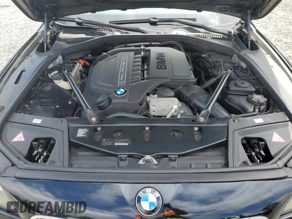 2014 BMW 5 Series 535i xDrive with VIN WBA5B3C52ED536678, listed as a Copart auction lot 61606815 with 53,412 mi miles and Salvage title. Bid and sale history available at DreamBid. Image 11.