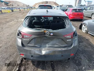 2014 Mazda 3 i Grand Touring with VIN JM1BM1M75E1207754, listed as a IAAI auction lot 41698583 with 128,887 mi miles and . Bid and sale history available at DreamBid. Image 16.