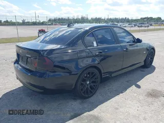 2007 BMW 3 Series 328i with VIN WBAVA33597PV67611, listed as a IAAI auction lot 41856072 with 209,720 mi miles and . Bid and sale history available at DreamBid. Image 4.