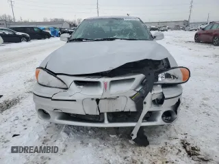 2002 Pontiac Grand Am GT with VIN 1G2NW12E42C173206, listed as a Copart auction lot 87939495 with 94,981 mi miles and Salvage Title. Bid and sale history available at carsss.com. Image 5.