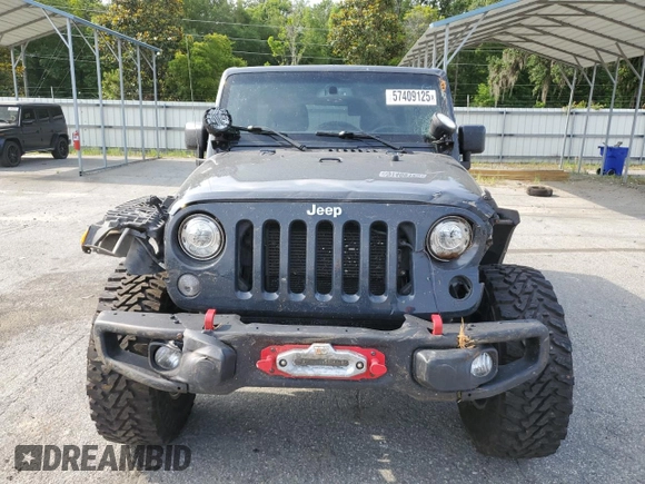2017 Jeep Wrangler Unlimited Rubicon с VIN 1C4HJWFG8HL646923, выставлен на аукционе Copart как лот 57409125 с пробегом 79 835 миль миль и Списание • Salvage title. История ставок и продаж доступна на DreamBid. Изображение 5.