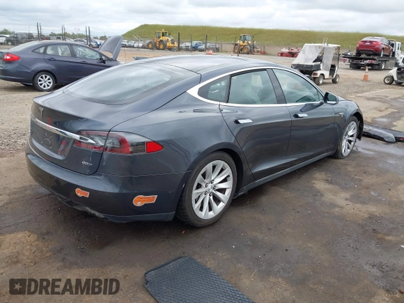2016 Tesla Model S 90D with VIN 5YJSA1E27GF129824, listed as a IAAI auction lot 42058080 with 113,171 mi miles and . Bid and sale history available at DreamBid. Image 4.