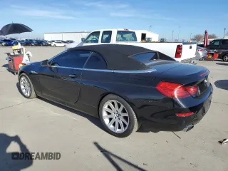 2012 BMW 6 Series 650i z VIN WBALZ3C51CDL72422, wystawiony jako Copart lot #87447914 z przebiegiem 115 376 mil mil oraz Szkody całkowita. Historia ofert i sprzedaży dostępna na DreamBid. Obrazek 2.