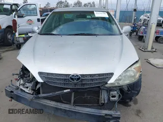 2004 Toyota Camry LE with VIN 4T1BE32K34U857725, listed as a IAAI auction lot 42131740 with 107,975 mi miles and . Bid and sale history available at DreamBid. Image 13.