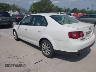 2010 Volkswagen Jetta Sedan Limited with VIN 3VWAZ7AJ7AM148894, listed as a IAAI auction lot 42173838 with 113,415 mi miles. Bid and sale history available at carsss.com. Image 3.