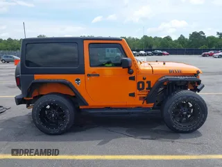 2013 Jeep Wrangler Sport z VIN 1C4AJWAG2DL538526, wystawiony jako IAAI lot #42378501 z przebiegiem 81 709 mil mil oraz . Historia ofert i sprzedaży dostępna na DreamBid. Obrazek 14.