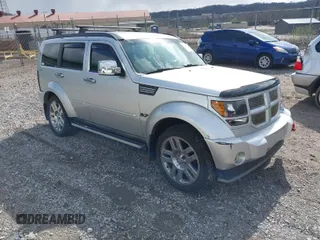 2011 Dodge Nitro Heat with VIN 1D4PU4GKXBW598683, listed as a IAAI auction lot 41958182 with 167,114 mi miles. Bid and sale history available at carsss.com. Image 1.