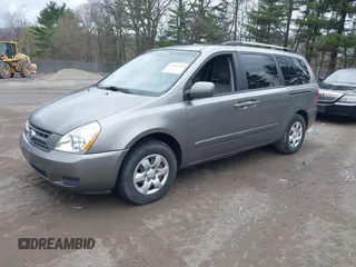 2010 Kia Sedona LX with VIN KNDMG4C30A6329449, listed as a IAAI auction lot 41946489 with 202,881 mi miles. Bid and sale history available at carsss.com. Image 2.
