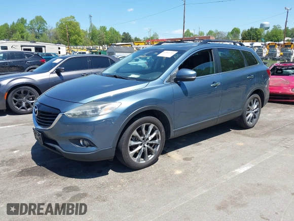 2015 Mazda CX-9 Grand Touring with VIN JM3TB3DV4F0448210, listed as a IAAI auction lot 42061711 with 149,289 mi miles. Bid and sale history available at carsss.com. Image 17.