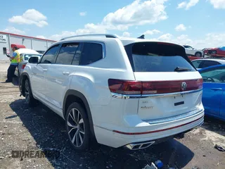 2024 Volkswagen Atlas SEL Premium R-Line with VIN 1V2FR2CAXRC582084, listed as a IAAI auction lot 42228600 with 20,389 mi miles and . Bid and sale history available at DreamBid. Image 3.