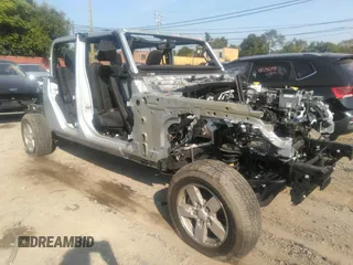 2022 Jeep Gladiator Willys z VIN 1C6HJTAG0NL131004, wystawiony jako IAAI lot #40307060 z przebiegiem Nie podano mil oraz . Historia ofert i sprzedaży dostępna na DreamBid. Obrazek 1.
