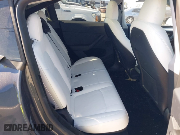 2023 Tesla Model Y Long Range with VIN 7SAYGDEE1PA203937, listed as a IAAI auction lot 41814421 with 9,138 mi miles. Bid and sale history available at carsss.com. Image 8.