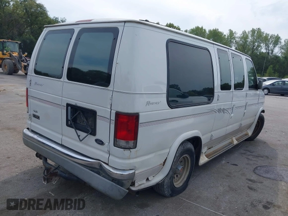 1999 Ford Econoline Cargo with VIN 1FDRE14WXXHB72976, listed as a IAAI auction lot 37688871 with 135,319 mi miles. Bid and sale history available at carsss.com. Image 4.