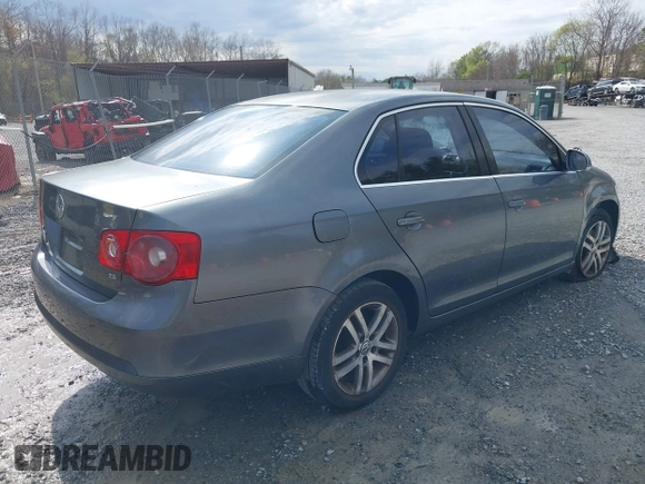 2005 Volkswagen Jetta Sedan 2.5L with VIN 3VWSG71K35M617763, listed as a IAAI auction lot 41963065 with 200,915 mi miles. Bid and sale history available at carsss.com. Image 4.