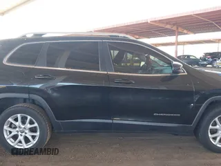 2015 Jeep Cherokee Latitude with VIN 1C4PJLCB8FW669150, listed as a IAAI auction lot 42122669 with 194,525 mi miles and . Bid and sale history available at DreamBid. Image 13.