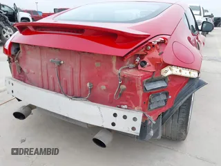 2009 Nissan 370Z Touring z VIN JN1AZ44E79M404171, wystawiony jako IAAI lot #41924058 z przebiegiem 75 940 mil mil oraz . Historia ofert i sprzedaży dostępna na DreamBid. Obrazek 6.