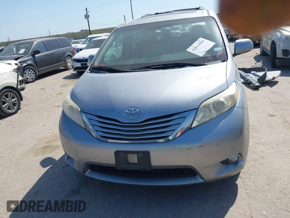 2012 Toyota Sienna XLE AAS with VIN 5TDYK3DC7CS185555, listed as a IAAI auction lot 42013098 with 140,969 mi miles. Bid and sale history available at carsss.com. Image 13.