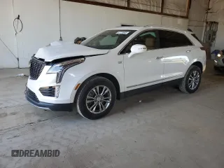 2020 Cadillac XT5 Premium Luxury FWD with VIN 1GYKNCRS9LZ235779, listed as a Copart auction lot 47775965 with 59,501 mi miles and Salvage Title. Bid and sale history available at carsss.com. Image 1.