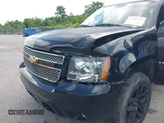 2013 Chevrolet Tahoe LT with VIN 1GNSCBE00DR337071, listed as a IAAI auction lot 42282457 with 151,460 mi miles and . Bid and sale history available at DreamBid. Image 6.