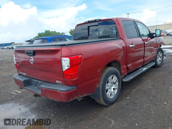 2017 Nissan Titan SV with VIN 1N6AA1E66HN563991, listed as a IAAI auction lot 42639581 with 183,449 mi miles and . Bid and sale history available at DreamBid. Image 4.
