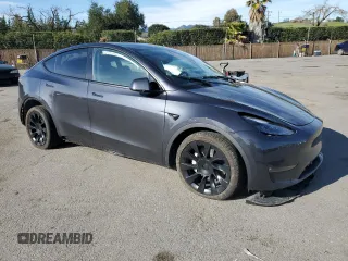 2025 Tesla Model Y Long Range with VIN 7SAYGDEE4SF272942, listed as a Copart auction lot 45817885 with 2,308 mi miles and Salvage Title. Bid and sale history available at DreamBid. Image 4.