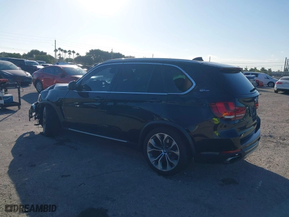 2018 BMW X5 xDrive40e iPerformance with VIN 5UXKT0C59J0W00801, listed as a IAAI auction lot 41081133 with 63,265 mi miles. Bid and sale history available at carsss.com. Image 3.
