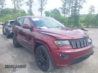 2021 Jeep Grand Cherokee Laredo X with VIN 1C4RJEAG0MC624737, listed as a IAAI auction lot 42133614 with 61,970 mi miles and . Bid and sale history available at DreamBid. Image 1.
