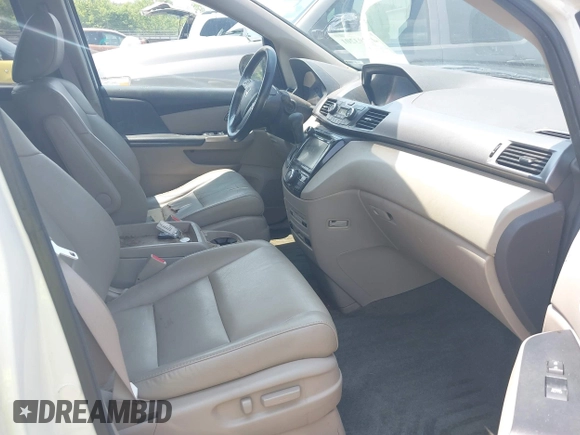 2014 Honda Odyssey EX-L z VIN 5FNRL5H66EB049572, wystawiony jako IAAI lot #42393201 z przebiegiem 145 793 mil mil oraz . Historia ofert i sprzedaży dostępna na DreamBid. Obrazek 5.