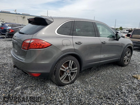 2011 Porsche Cayenne S with VIN WP1AB2A2XBLA55565, listed as a Copart auction lot 63094305 with 105,250 mi miles and Salvage title. Bid and sale history available at DreamBid. Image 3.