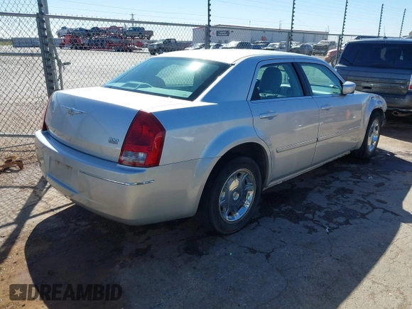2006 Chrysler 300 Touring with VIN 2C3KA53G86H111027, listed as a IAAI auction lot 41870312 with 59,870 mi miles. Bid and sale history available at carsss.com. Image 4.