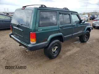 2000 Jeep Cherokee with VIN 1J4FF48S3YL149593, listed as a Copart auction lot 52489045 with 290,231 mi miles and Salvage title. Bid and sale history available at DreamBid. Image 3.