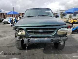 2000 Ford Explorer XLT z VIN 1FMZU73E9YZB18904, wystawiony jako Copart lot #47890925 z przebiegiem 248 363 mil mil oraz Szkoda całkowita • Salvage title. Historia ofert i sprzedaży dostępna na DreamBid. Obrazek 5.