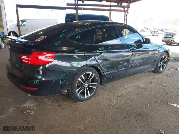 2014 BMW 3 Series Gran Turismo 328i xDrive with VIN WBA3X5C55ED242955, listed as a IAAI auction lot 41743111 with 71,095 mi miles. Bid and sale history available at carsss.com. Image 4.