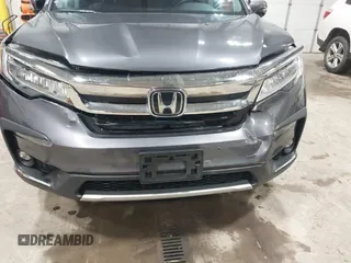 2019 Honda Pilot Touring 7-Passenger с VIN 5FNYF6H68KB082089, выставлен на аукционе IAAI как лот 42616148 с пробегом 69 913 миль миль и . История ставок и продаж доступна на DreamBid. Изображение 6.