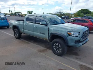 2023 Toyota Tacoma SR5 z VIN 3TYDZ5BN6PT033769, wystawiony jako IAAI lot #41960433 z przebiegiem 19 897 mil mil oraz . Historia ofert i sprzedaży dostępna na DreamBid. Obrazek 1.