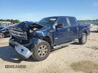 2014 Ford F-150 XL with VIN 1FTFW1ETXEKD01260, listed as a Copart auction lot 55203685 with 153,410 mi miles and Salvage title. Bid and sale history available at DreamBid. Image 1.