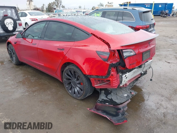 2021 Tesla Model 3 Performance with VIN 5YJ3E1EC5MF050598, listed as a IAAI auction lot 41778169 with 74,710 mi miles and . Bid and sale history available at carsss.com. Image 3.