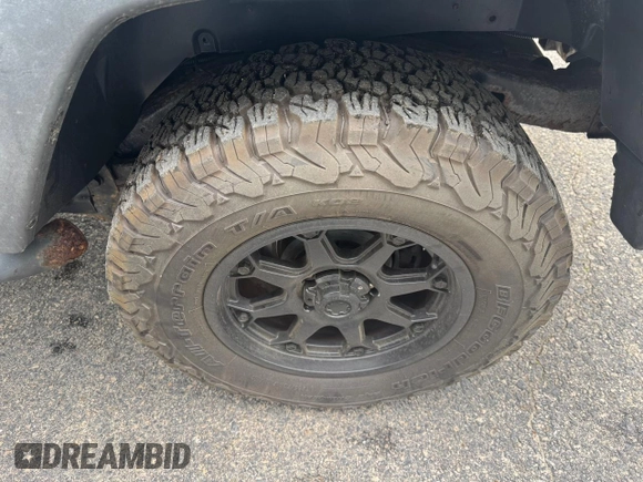 2007 Jeep Wrangler Rubicon с VIN 1J4GA64127L170574, выставлен на аукционе Copart как лот 60906965 с пробегом 142 976 миль миль и Чистый • Clean title. История ставок и продаж доступна на DreamBid. Изображение 10.