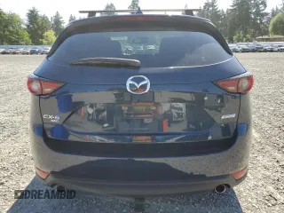 2018 Mazda CX-5 Grand Touring z VIN JM3KFBDM5J0379246, wystawiony jako Copart lot #58587865 z przebiegiem 46 339 mil mil oraz Szkody całkowita. Historia ofert i sprzedaży dostępna na DreamBid. Obrazek 6.