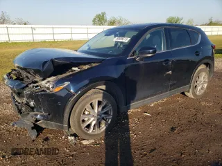 2019 Mazda CX-5 Grand Touring with VIN JM3KFADM4K1589715, listed as a Copart auction lot 50506515 with 20,740 mi miles and Salvage Title. Bid and sale history available at carsss.com. Image 1.