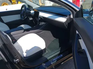 2019 Tesla Model 3 Long Range with VIN 5YJ3E1EB9KF231742, listed as a IAAI auction lot 42114608 with 86,657 mi miles and . Bid and sale history available at DreamBid. Image 5.